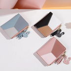 Monedero mini con borla decorativa