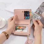 Monedero mini con borla decorativa