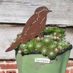 Pájaro decorativo de metal con acabado rústico