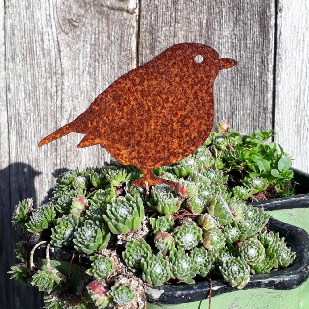 Pájaro decorativo de metal con acabado rústico
