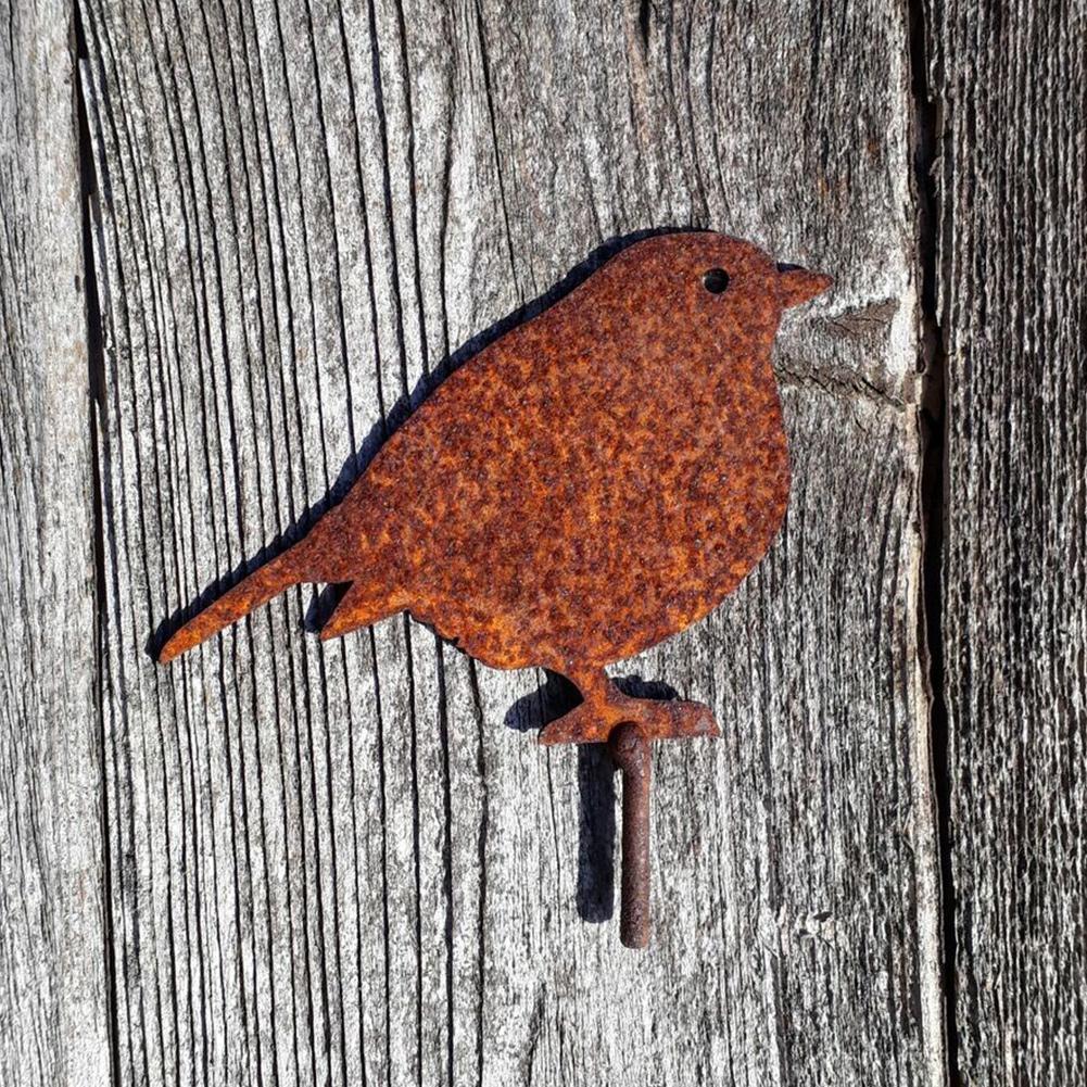 Pájaro decorativo de metal con acabado rústico
