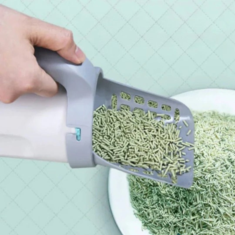 Pala autolimpiable para arena de gato con dispensador de bolsas integrado