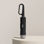 Paraguas plegable con correa de anilla