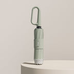 Paraguas plegable con correa de anilla