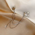Pendientes de estrella y planeta con cadenas