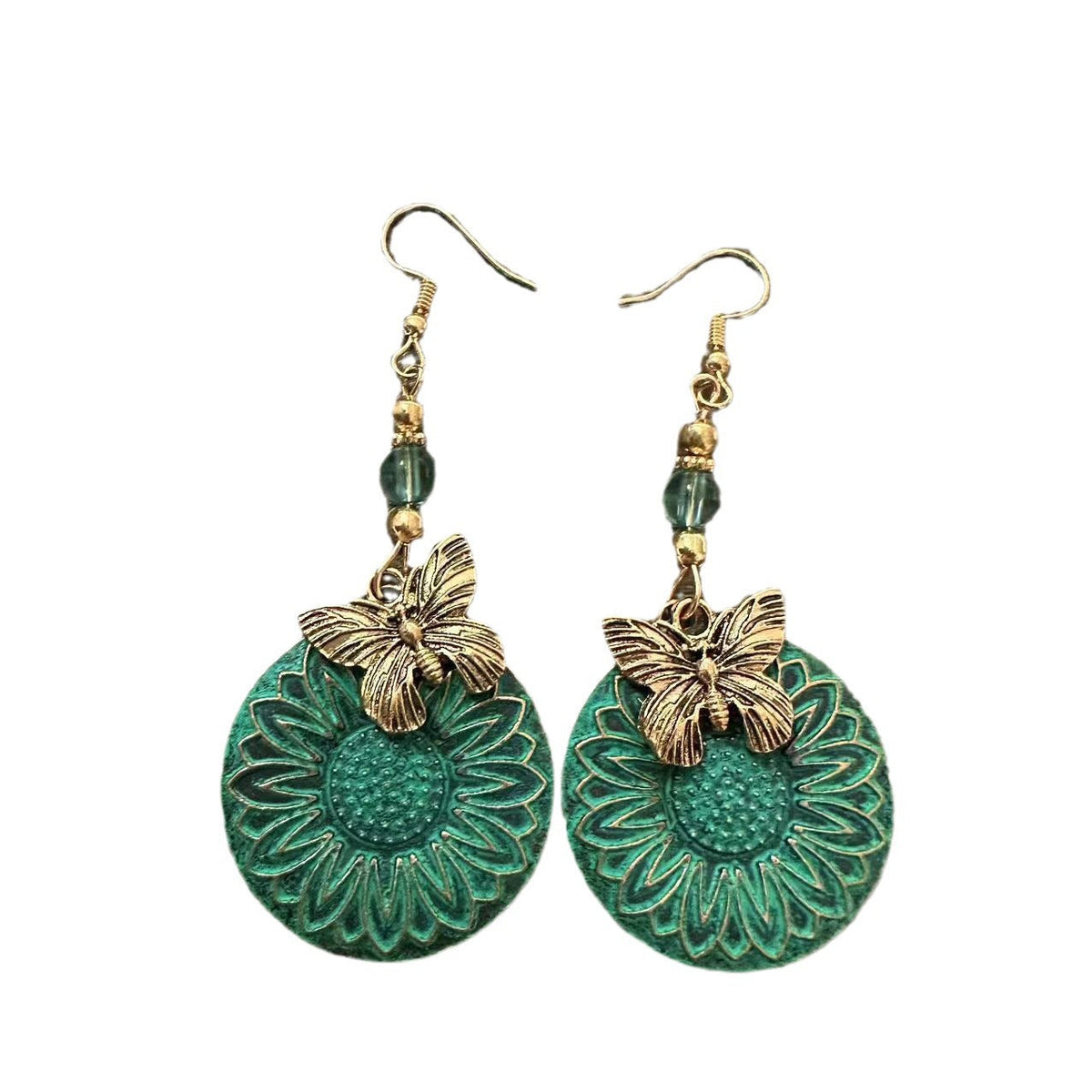 Pendientes elegantes con motivo floral y mariposas