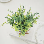 Planta artificial decorativa con maceta
