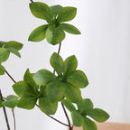 Planta verde decorativa artificial