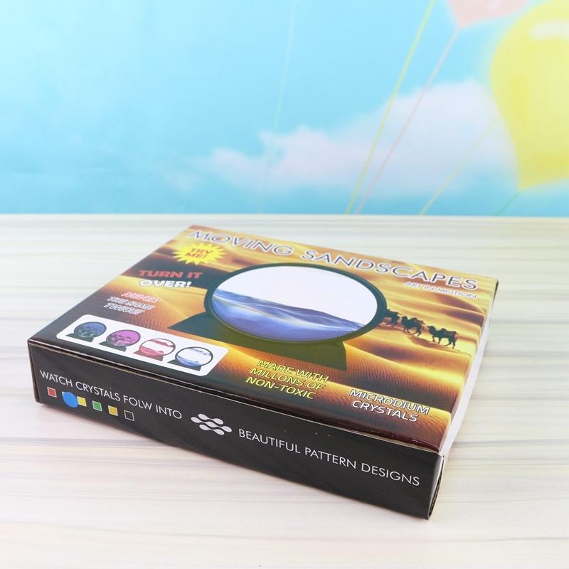 Reloj de arena decorativo con paisajes de arena en movimiento