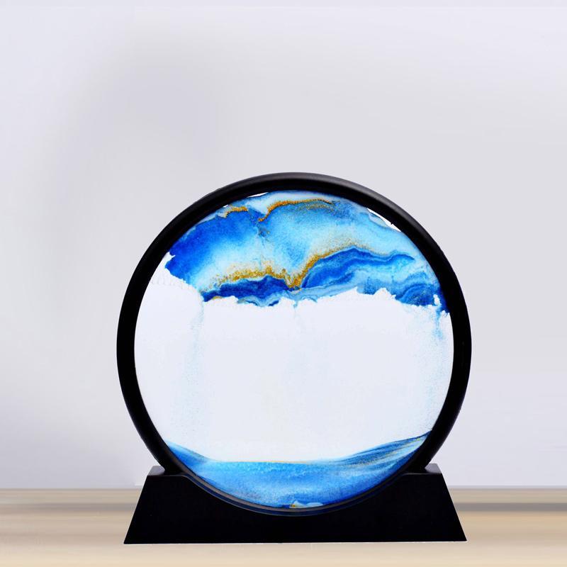 Reloj de arena decorativo con paisajes de arena en movimiento