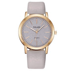 Reloj de pulsera analógico de cuarzo para mujer con correa de piel sintética estilo Ginebra