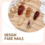 Set de uñas postizas con flores elegantes y brillos