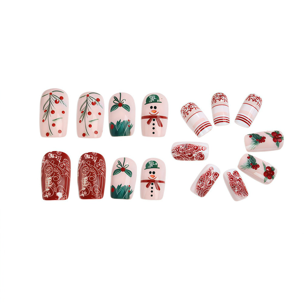 Set de uñas postizas navideñas con diseños festivos