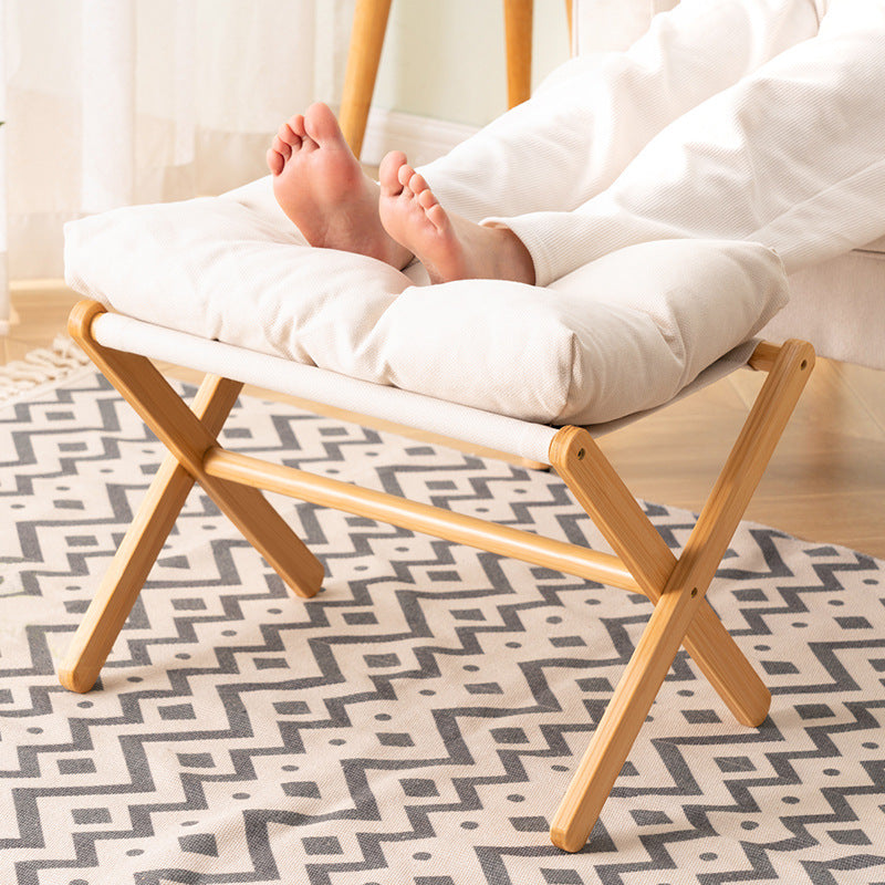 Taburete plegable con acolchado confortable y estructura de madera resistente