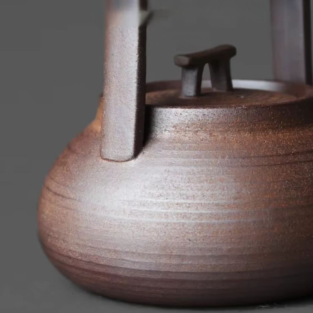 TEAGLOW – Tetera de cerámica con calentador para un servicio acogedor