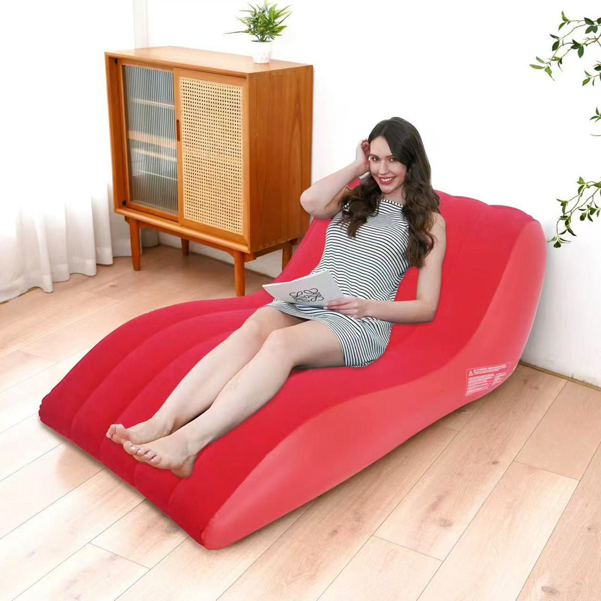 Tumbona hinchable relax con reposapiés para mujer