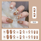 Uñas postizas artísticas con diseño de osito y lazos