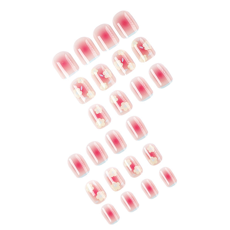 Uñas postizas de gel con diseños florales delicados