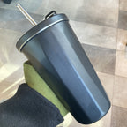 Vaso con pajita plegable