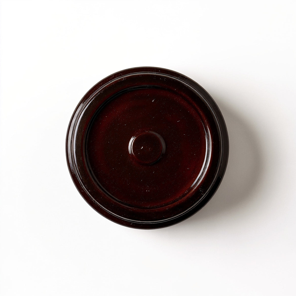 ORNISHOP Cedarwood Musk Soy Candle — Tarro marrón oscuro con textura en relieve